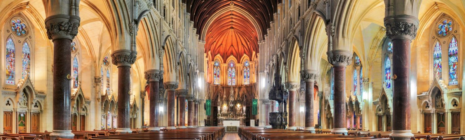The richly detailed nave and sanctuary inside St Colman’s Cathedral