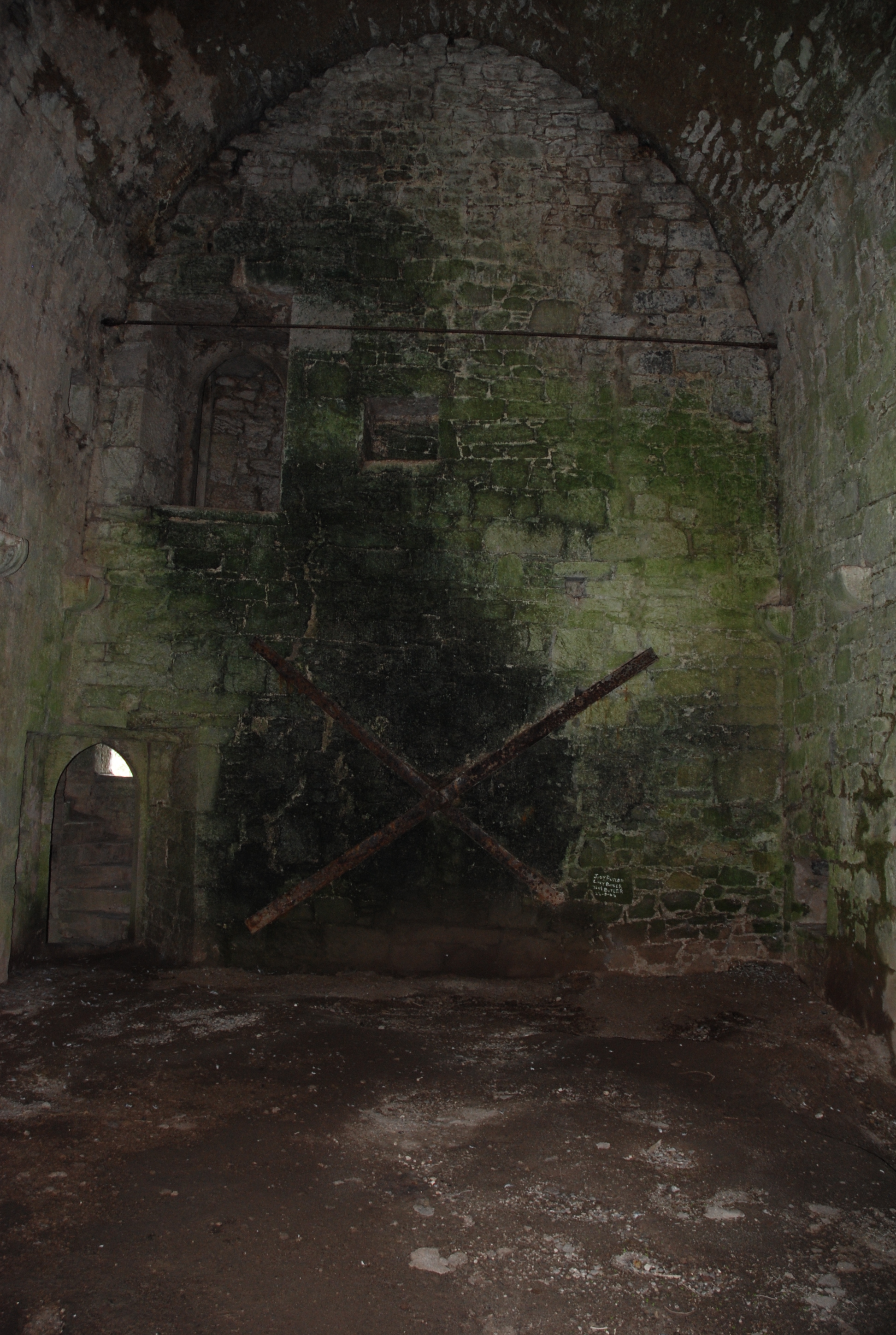 Roofless interior before restoration